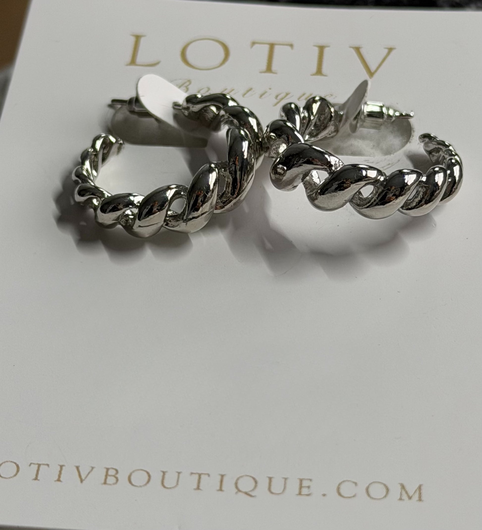 Silver chain hoop earrings on a white card with 'LOTIV Boutique' branding.